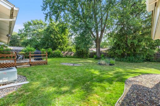 Enjoy views from the Deck of the large back yard and wooded privacy!