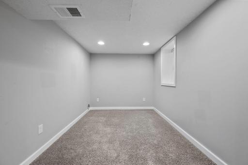 The lower level features a Den that will also serve as another Bedroom with the egress window