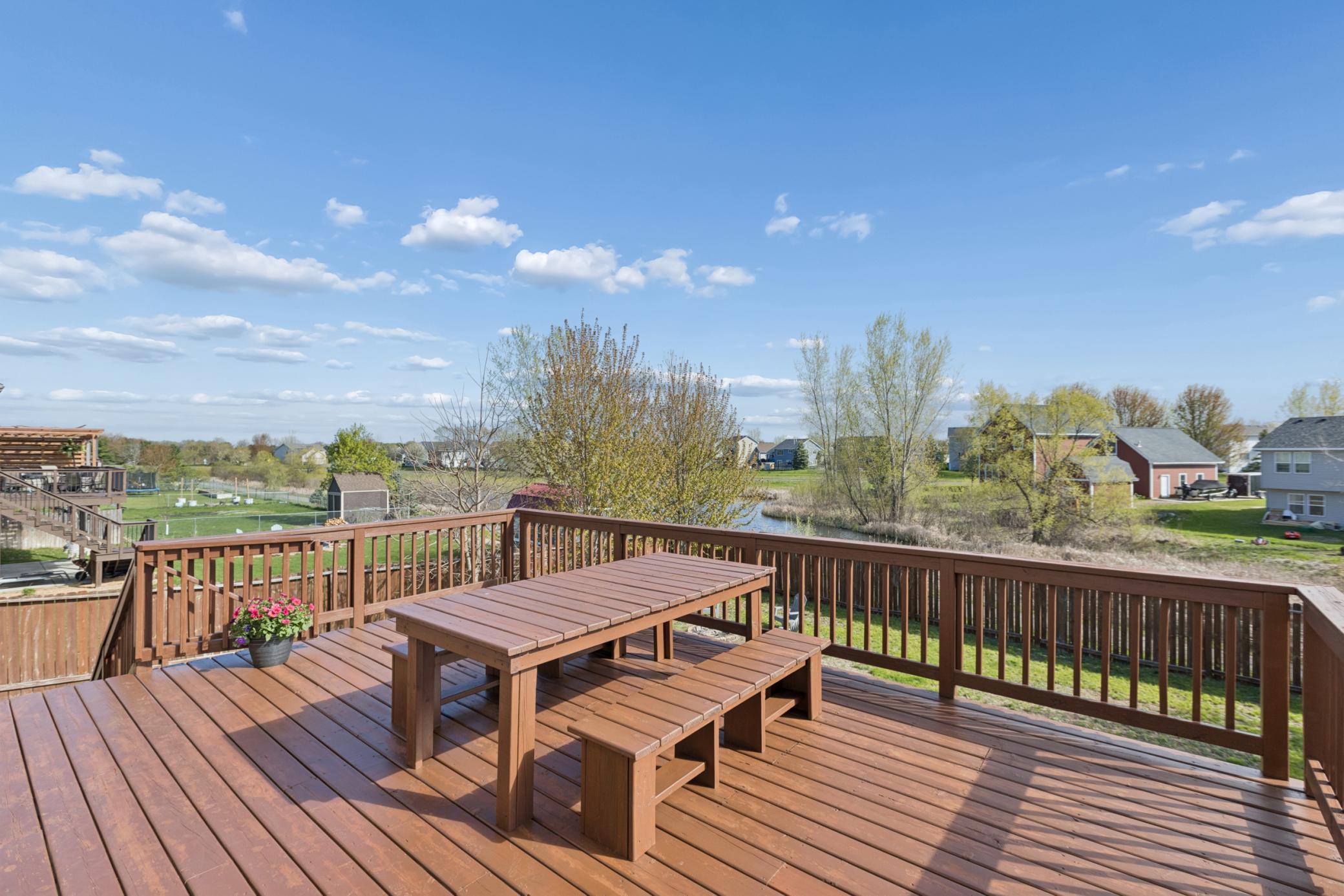 This deck!! Freshly stained and ready for guests! Enjoy BBQ and beautiful backyard views that overlook wetlands and nature!