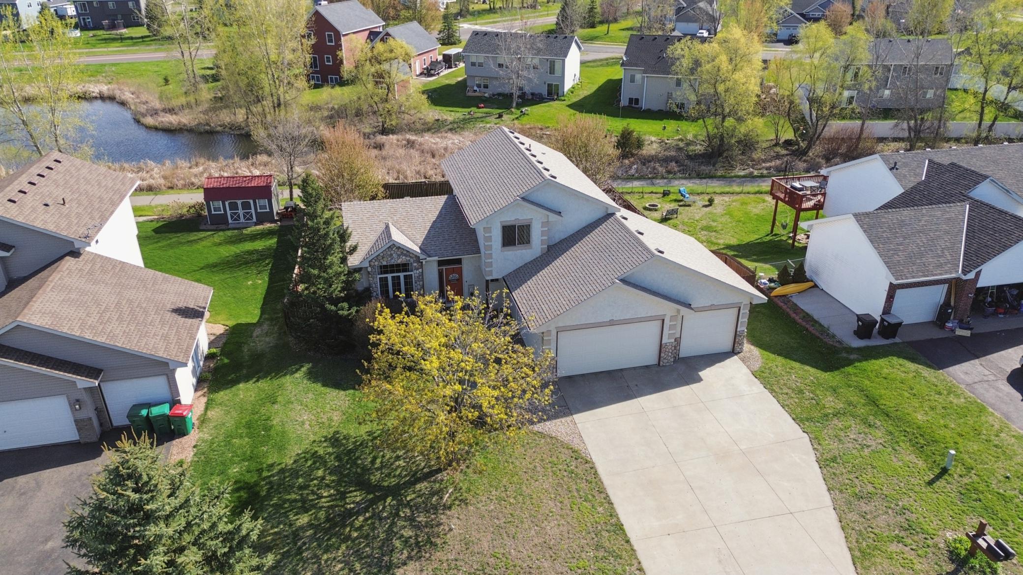 WOW! WOW! WOW!! Welcome home to this spectacular modified 2 story nestled on a cul-de-sac lot w/ concrete drive, fenced yard, and wonderful backyard with wetland views and walking path!