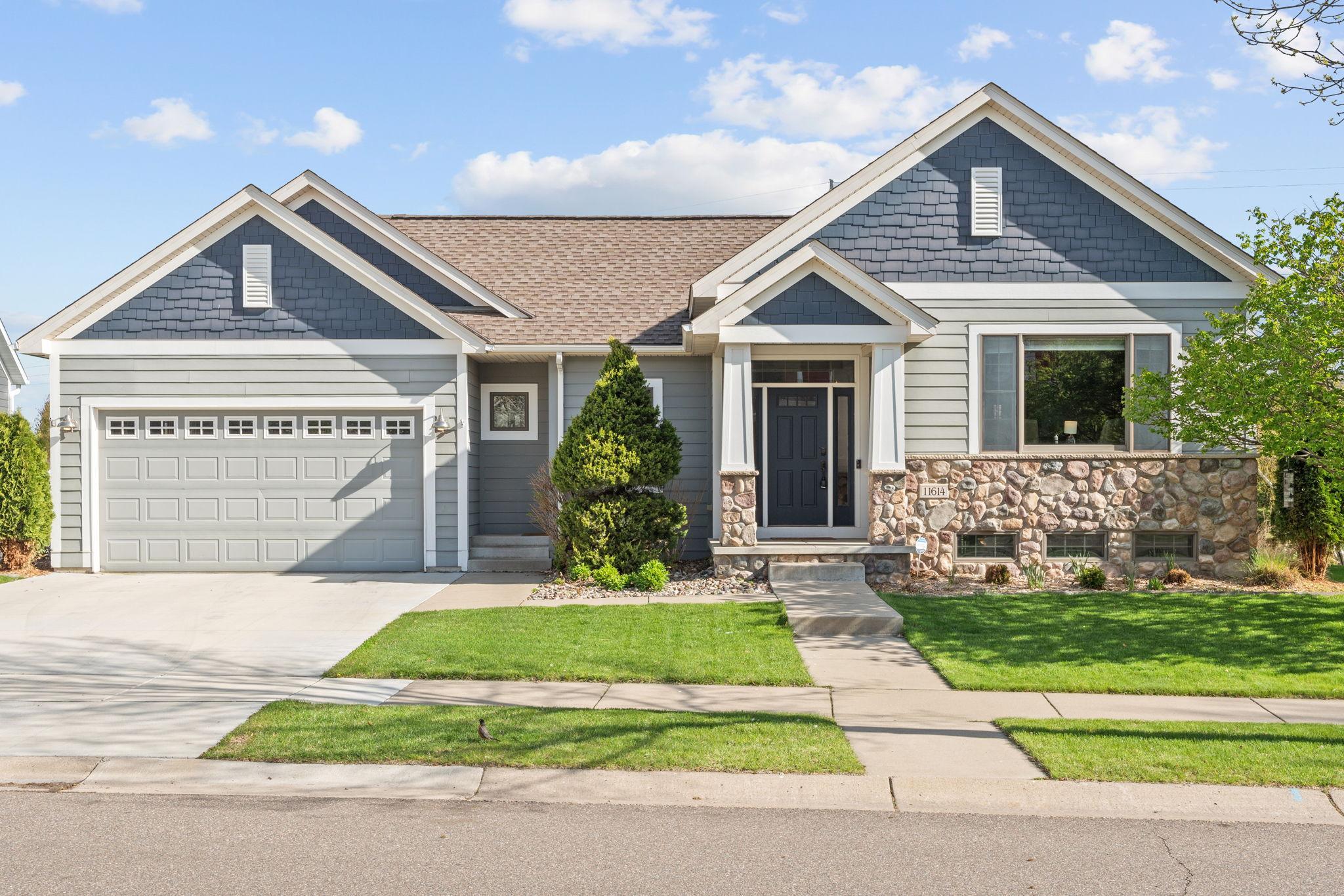 Beautiful curb appeal with fresh landscaping and welcoming front entry.