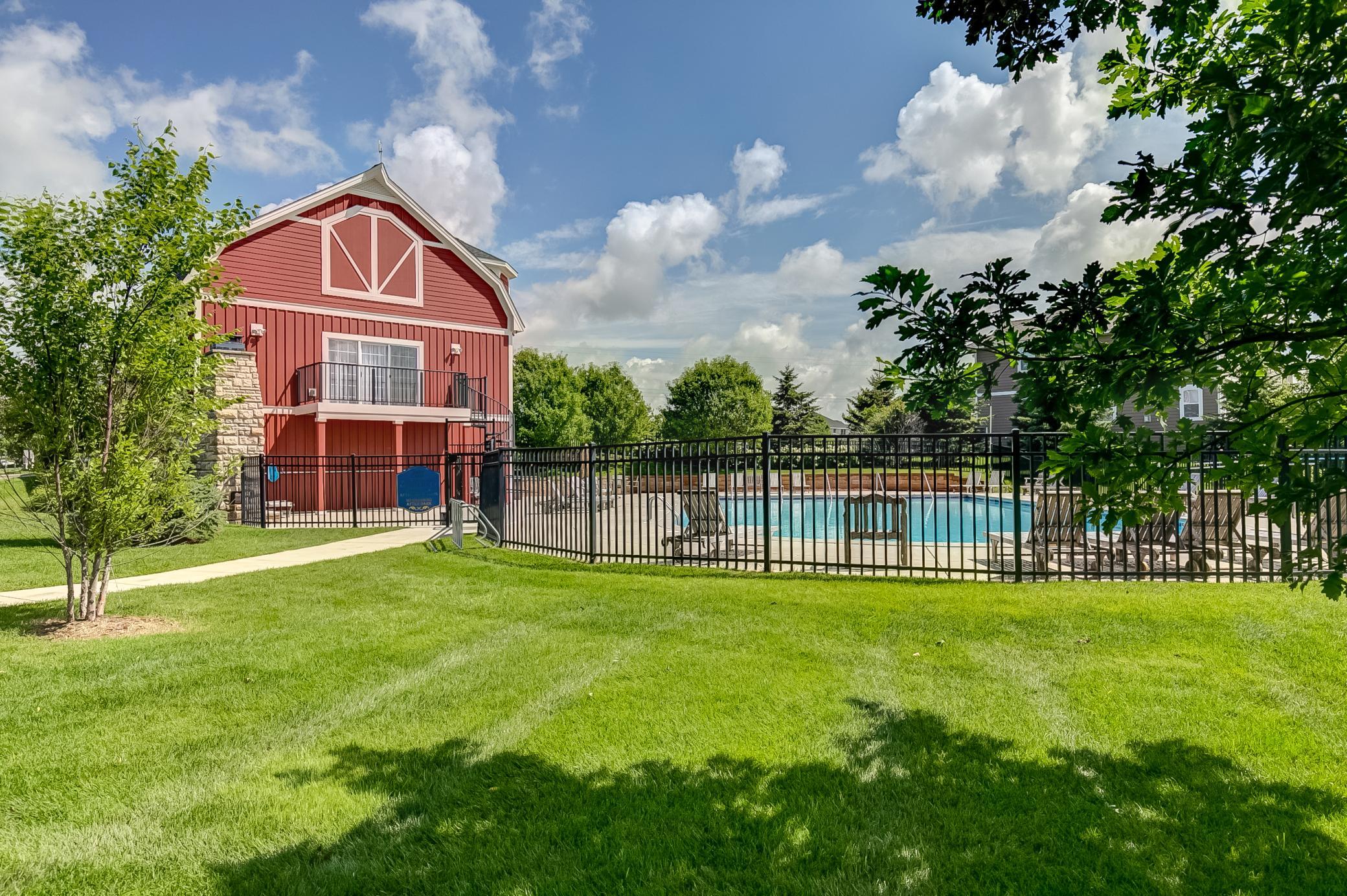 Residents enjoy access to the Towne Lakes community pool and clubhouse.