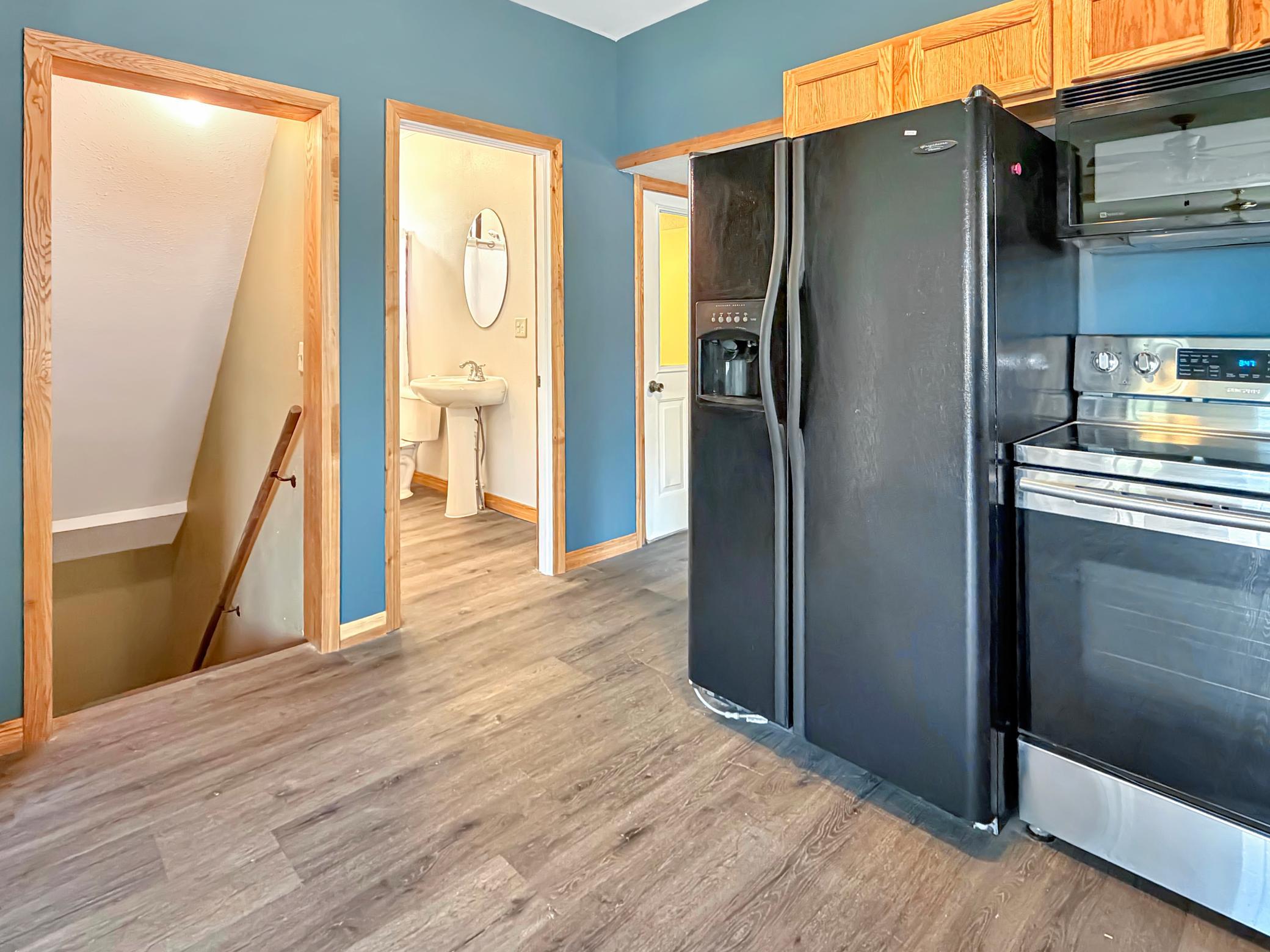 We'll note the bathroom, conveniently just off the kitchen