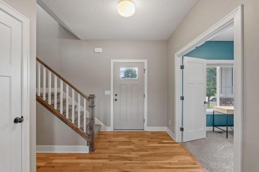 Front door with Main floor office on the right