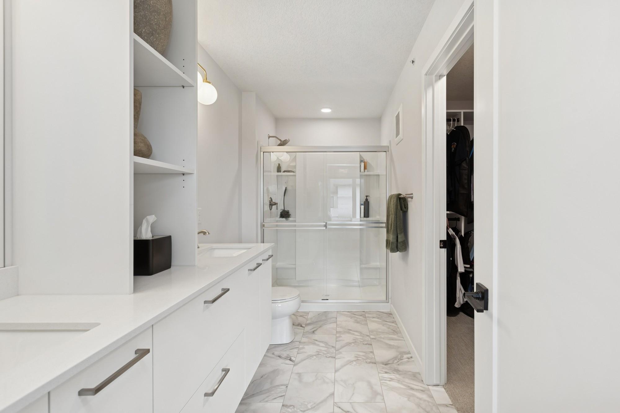 Primary spa like bath with walk-in closet