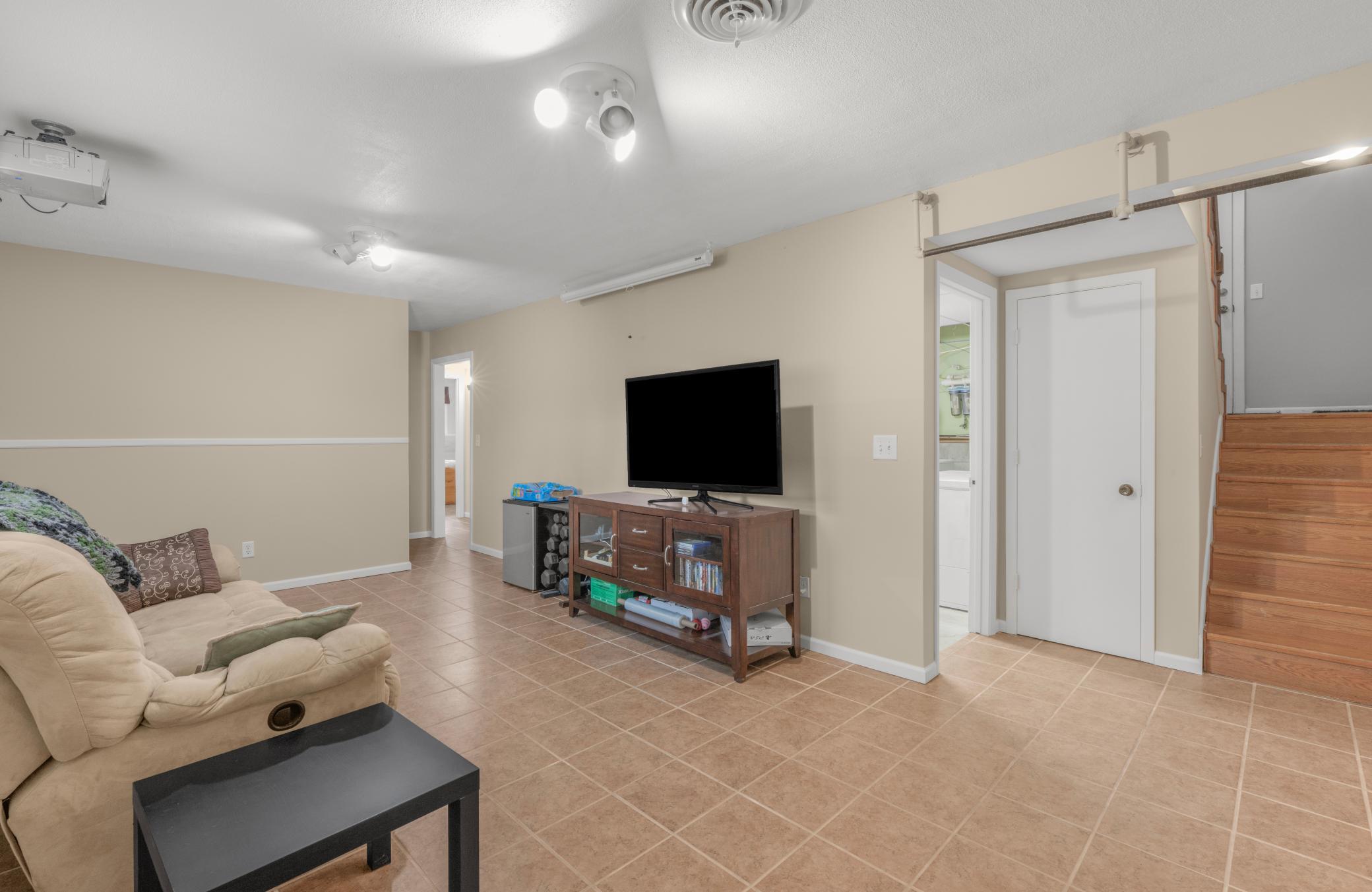 What a great space for a family room, gaming area, office or flex area
