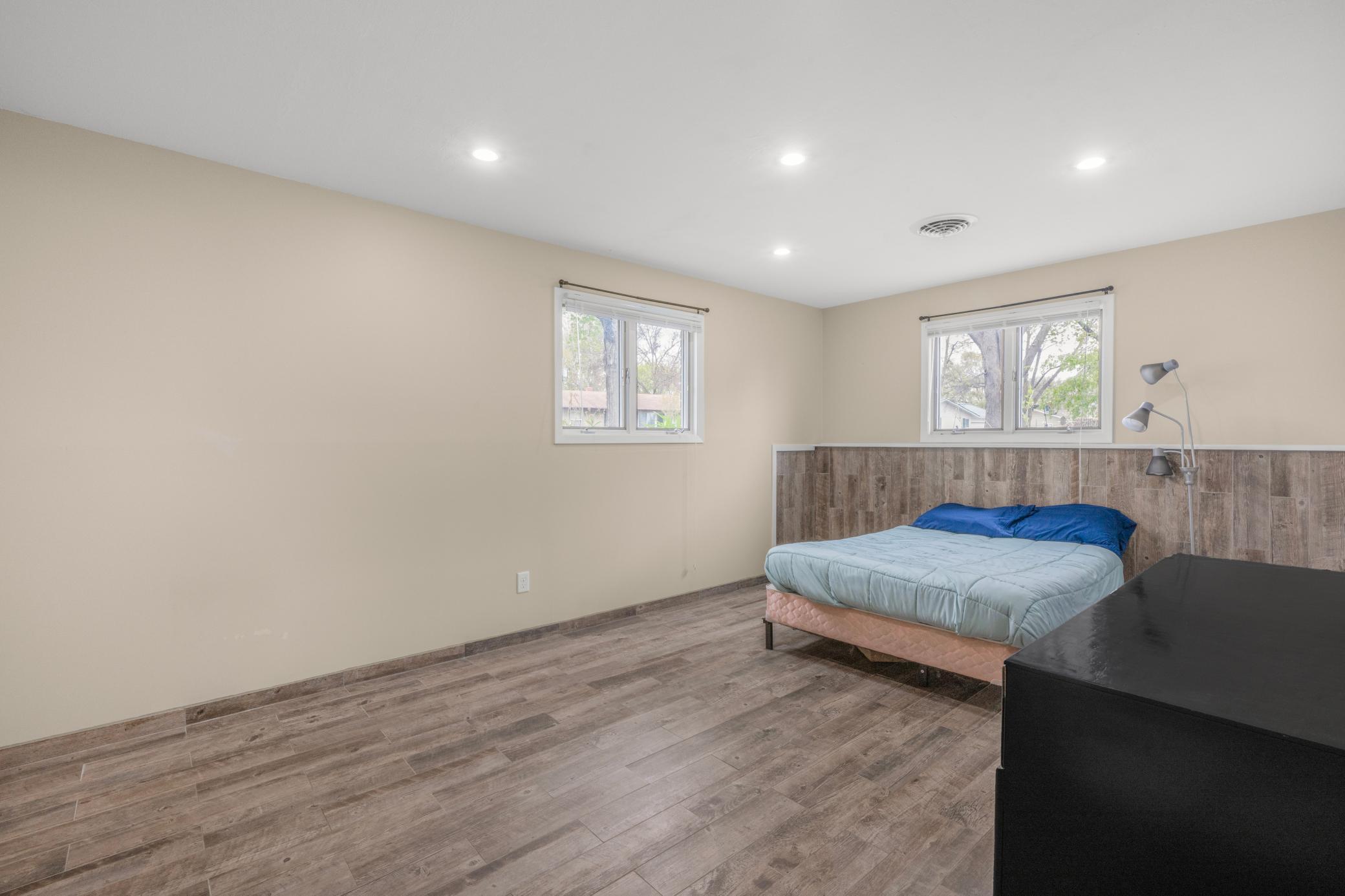 Look at how large this lower level bedroom is!