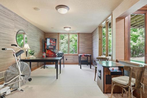 This light and bright game room is included but still offers separation.