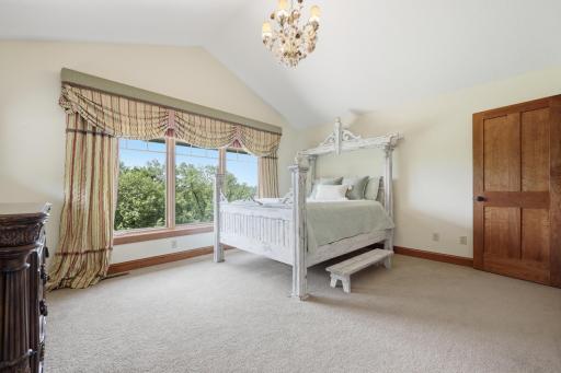 Bedroom number two on the upper level has its own private ensuite as well as a writing desk and built-in bookshelves.