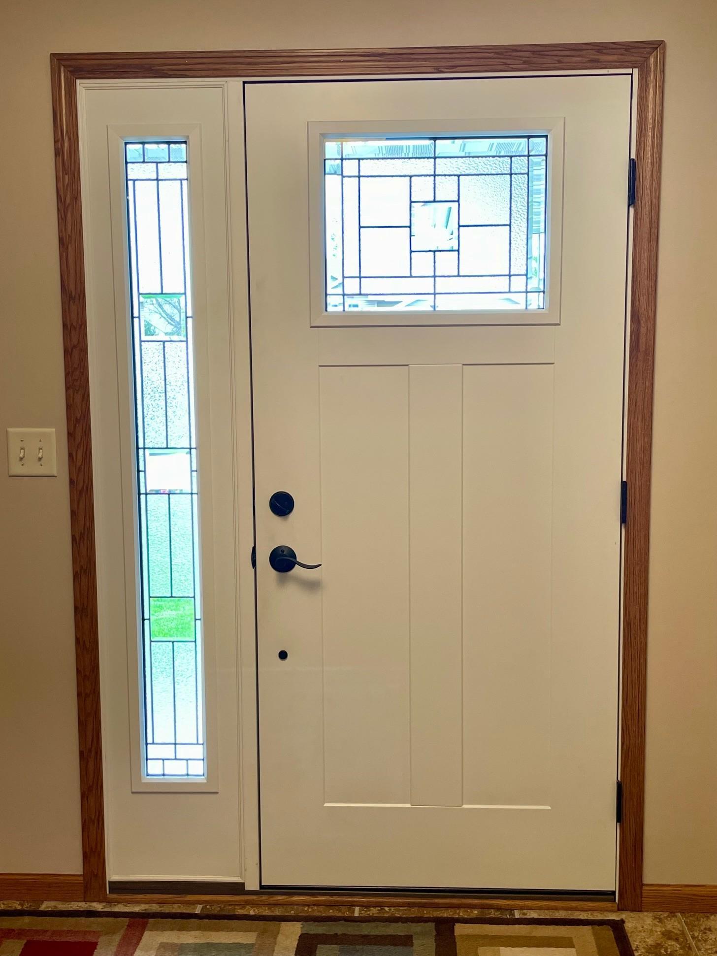 Front entry with side panel light