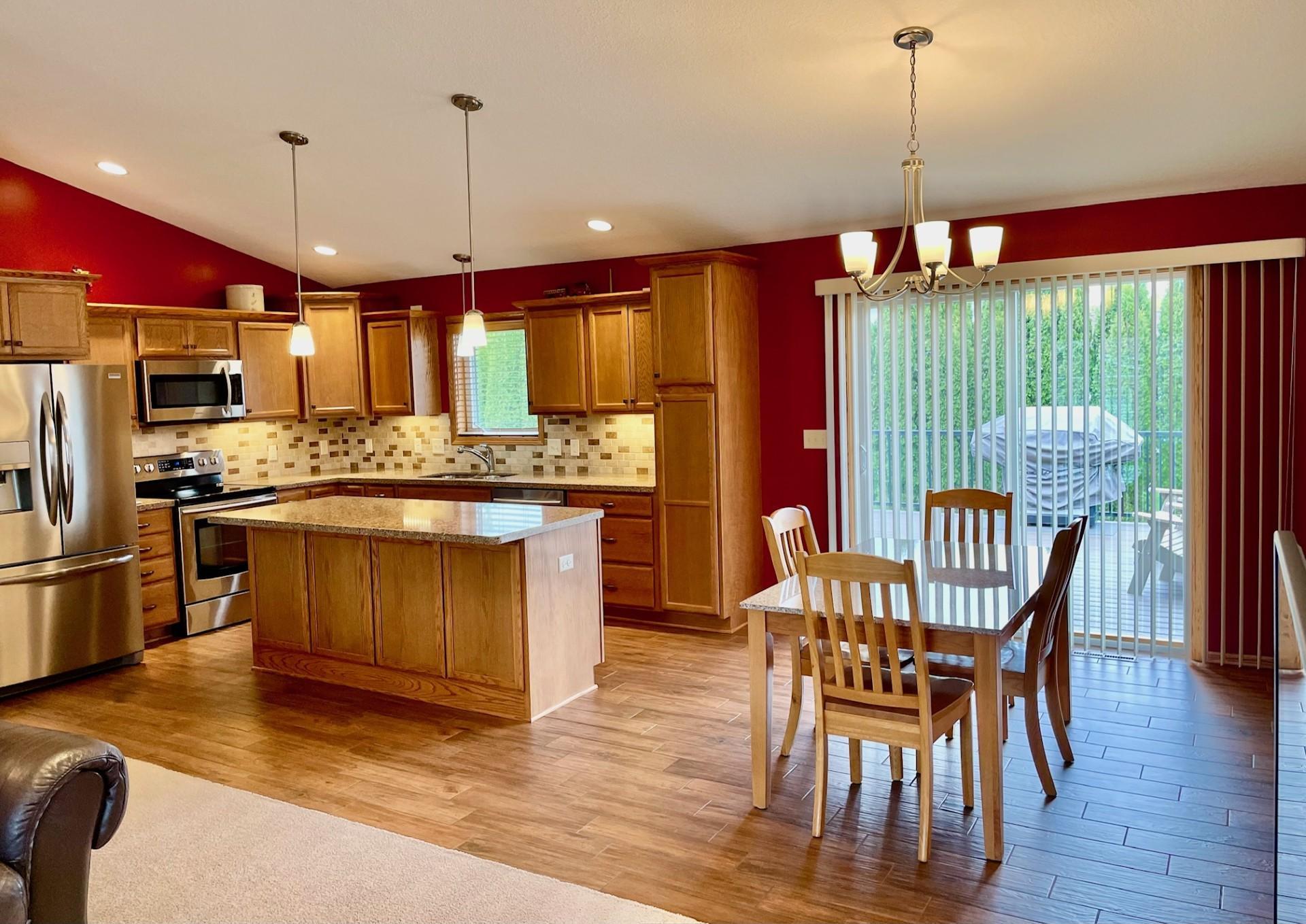 Kitchen opens to informal dining room