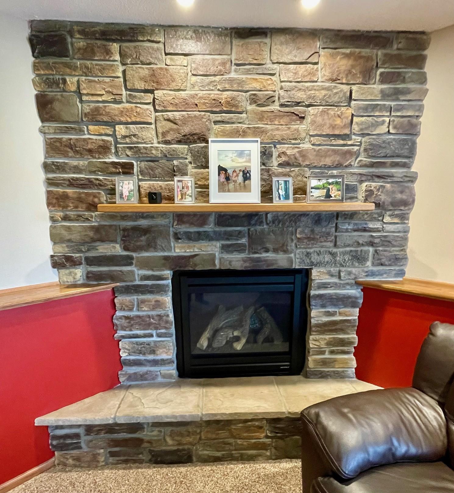 Stone fireplace with gas insert