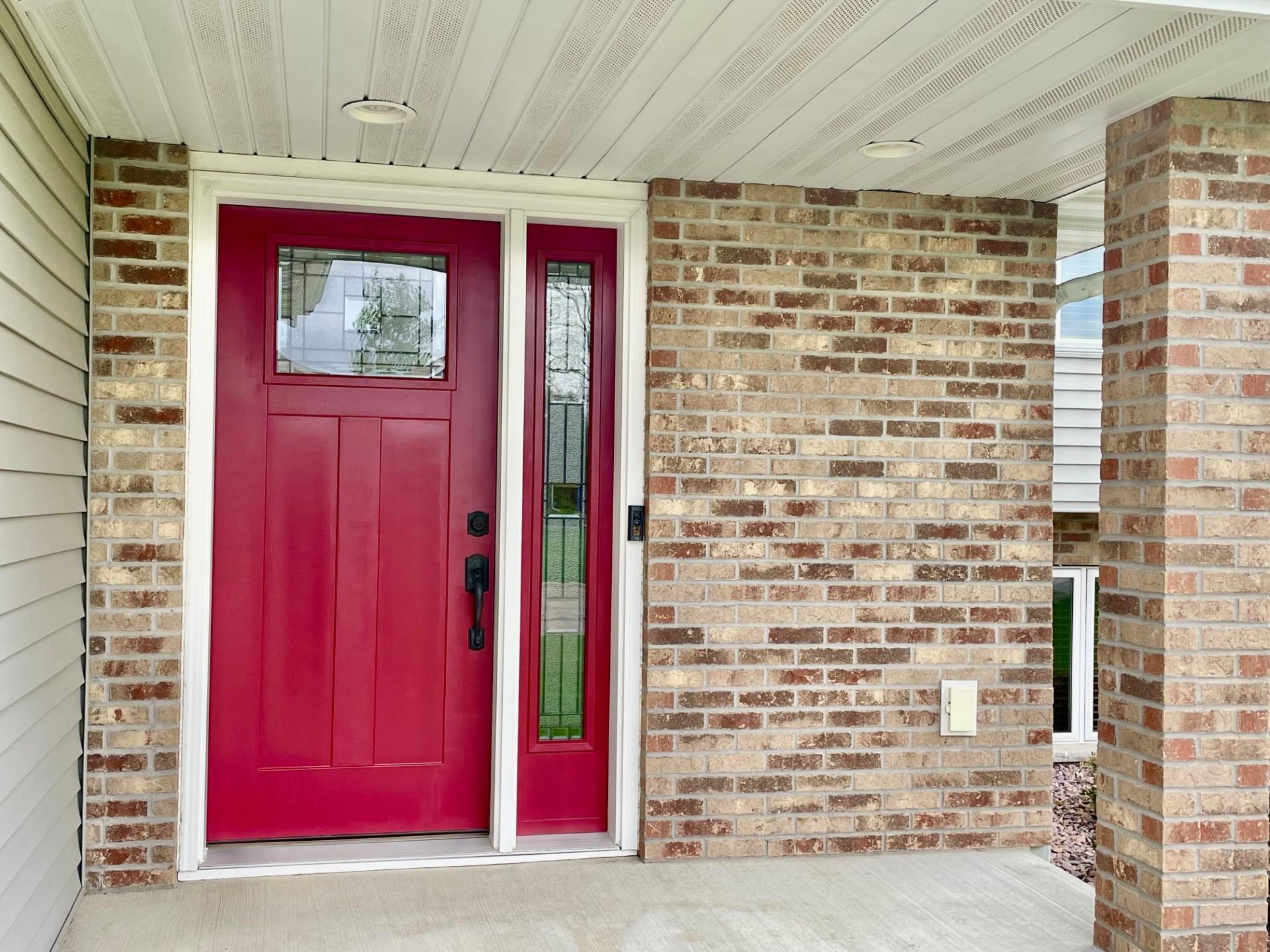 Front entry has brick accent