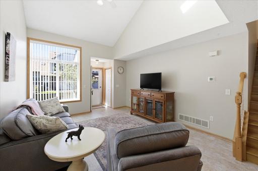 Soaring vaulted ceilings and abundant natural light give this living room an airy, open feel youâll appreciate every day.