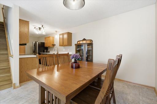 Conveniently located just off the kitchen, the dining area offers a comfortable setting for casual meals, holiday dinners, or entertaining guests.
