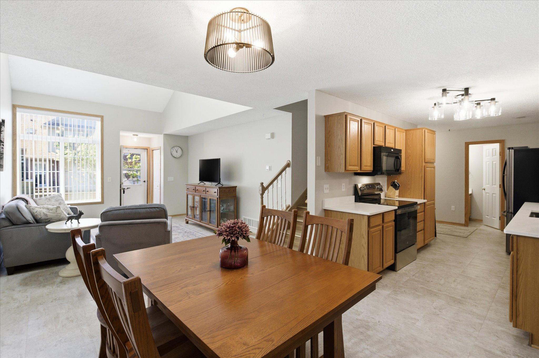 The open flow keeps everyone connected while maintaining a warm and inviting feel.