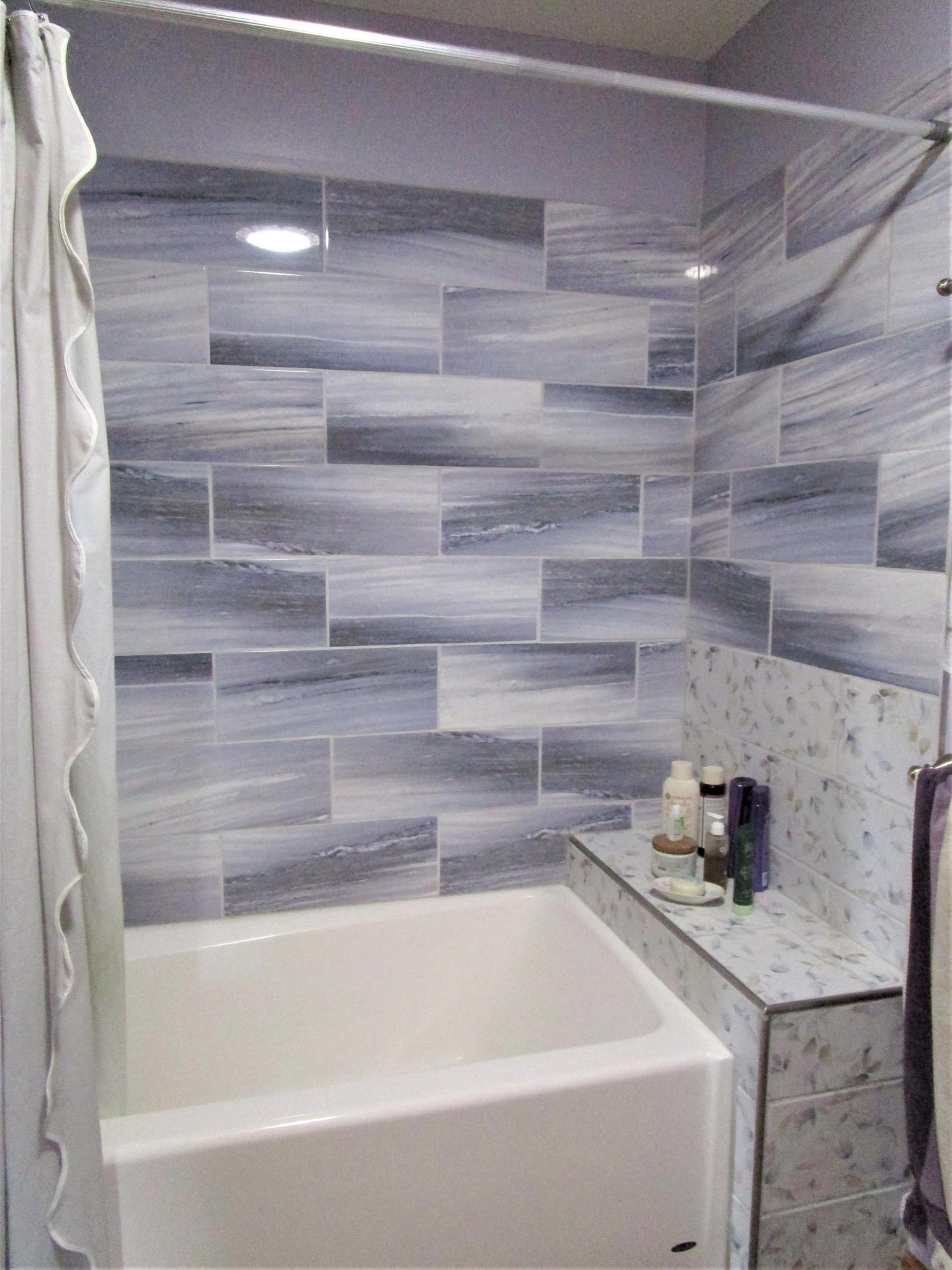 Custom Tiles In Upper Level Full Bathroom