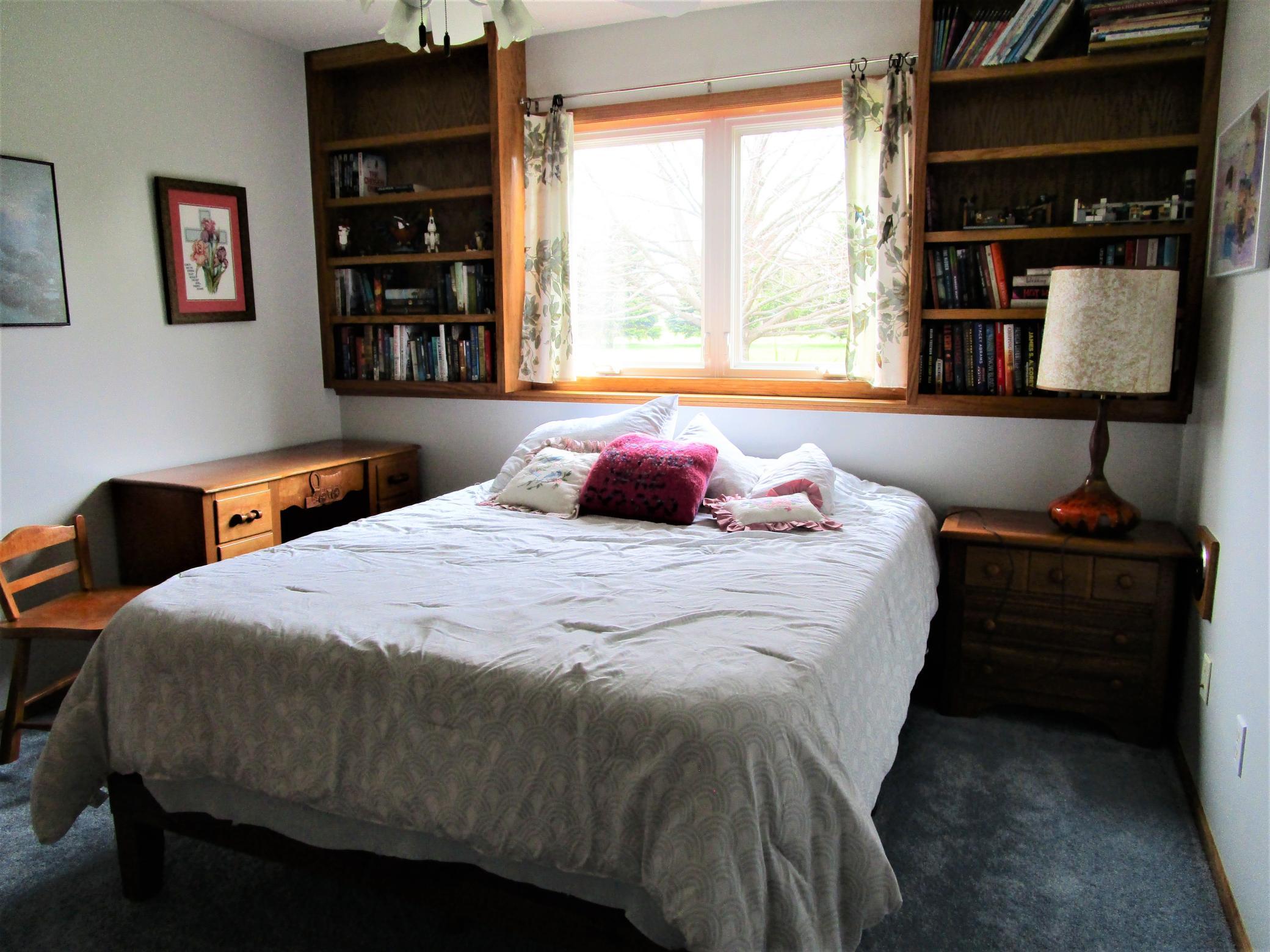 Lower Level 4th Bedroom With Built-In Bookcases
