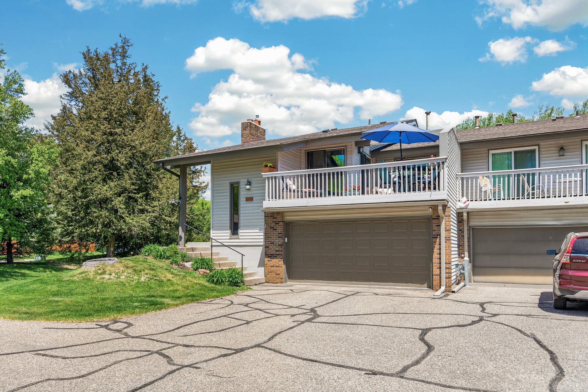 Exceptional end-unit townhome in a premier Eden Prairie location!