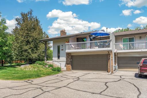Exceptional end-unit townhome in a premier Eden Prairie location!