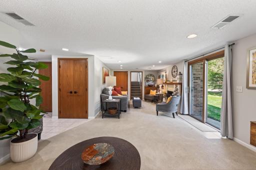 Patio door with access to the manicured, side yard!