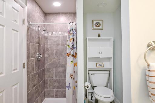 Another view of owner's suite bathroom. Tiled shower.