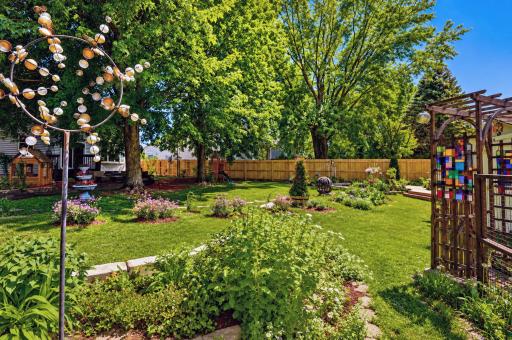 Over 250ft of 6-foot cedar privacy fence was recently installed, completely enclosing this backyard oasis!