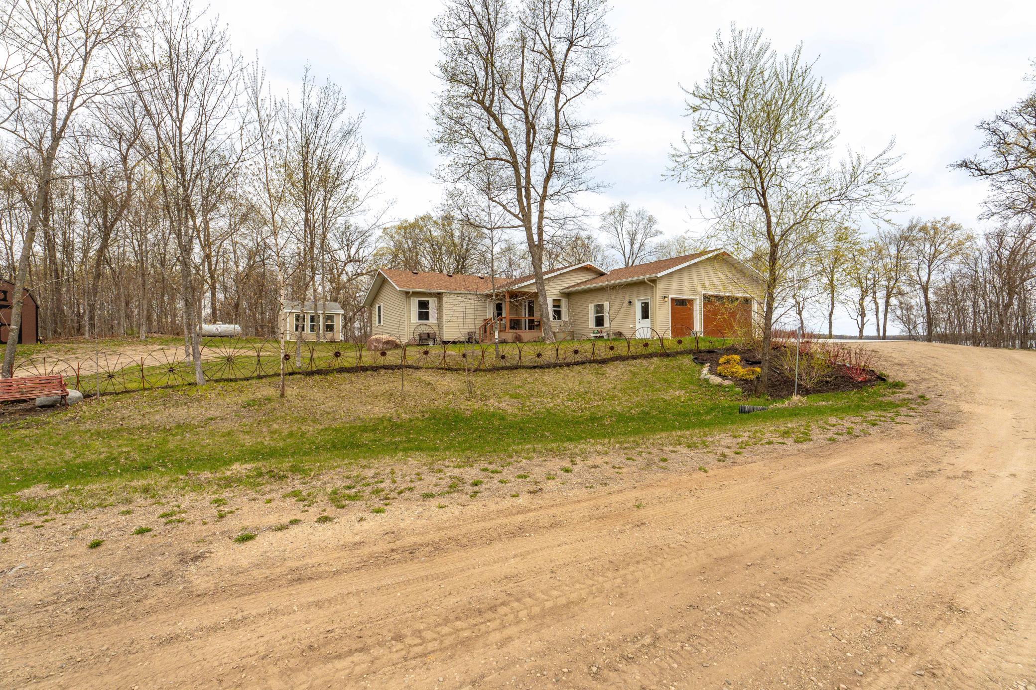 Spring road view from gravel