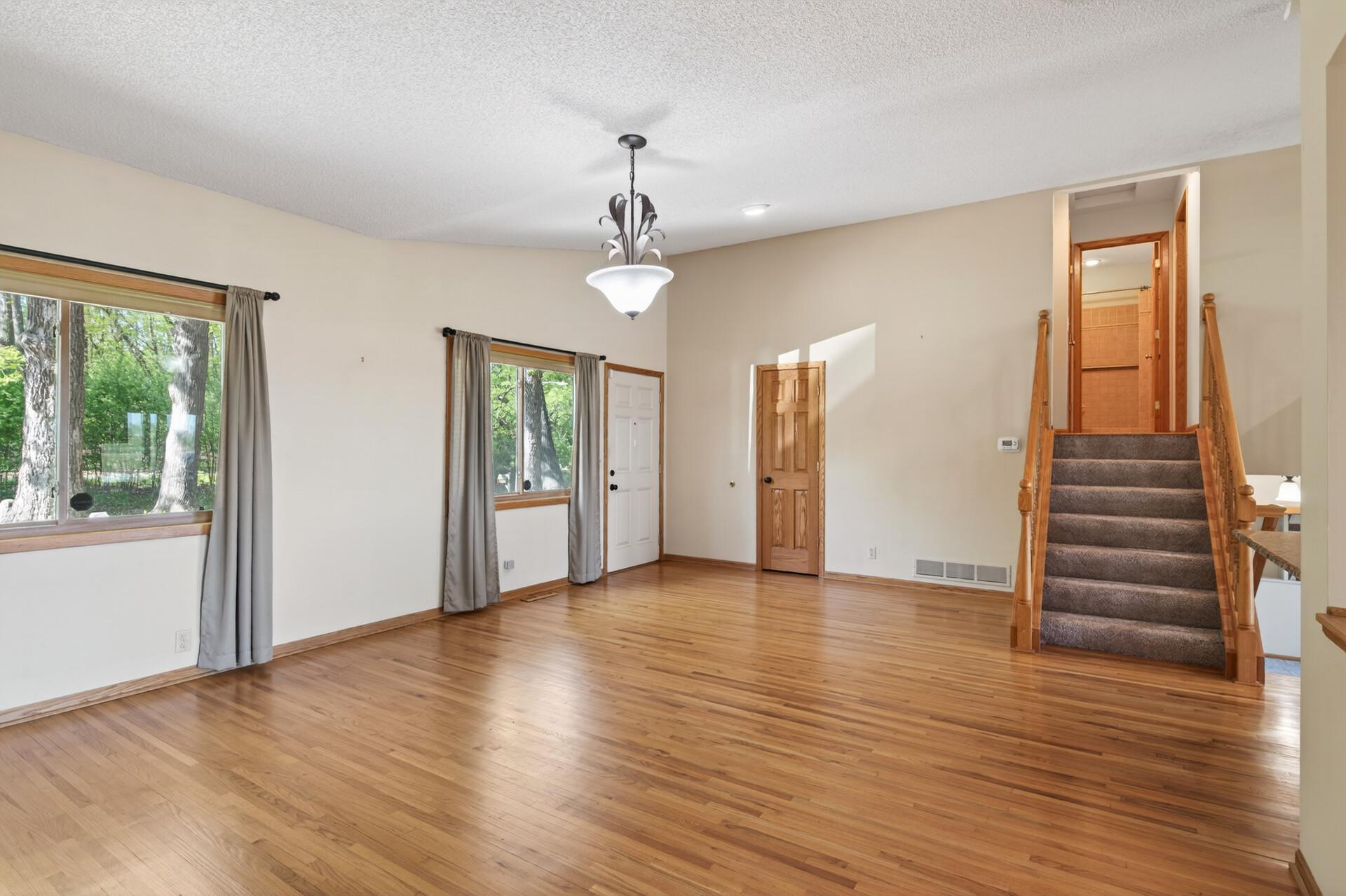 Formal dining looks out the front of the home and connects seamlessly to the kitchen.