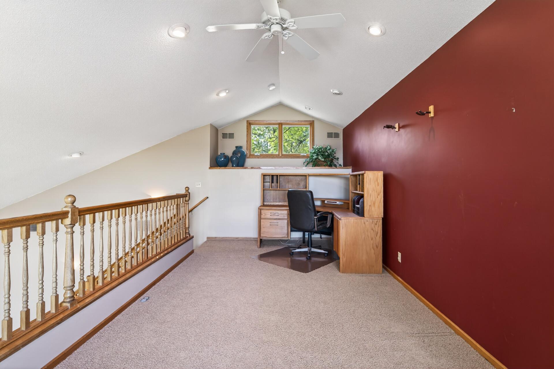 Loft in the addition - great space to set up your office when working from home and taking in the amazing view of Eagle Lake!