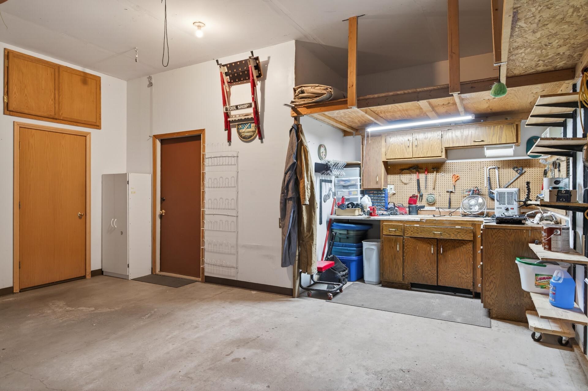 Garage includes a bonus bump-out workshop space.