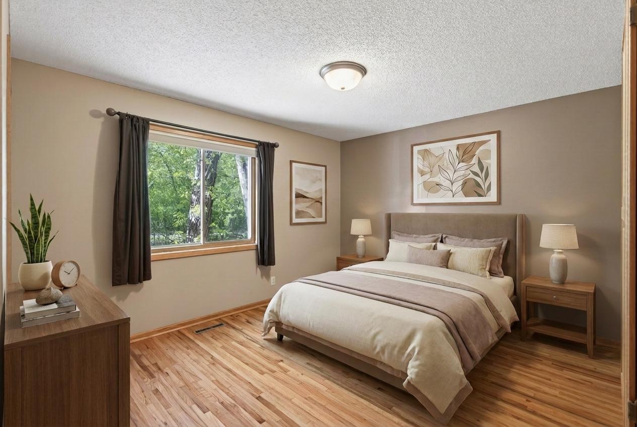 Virtually staged 2nd bedroom on upper level.