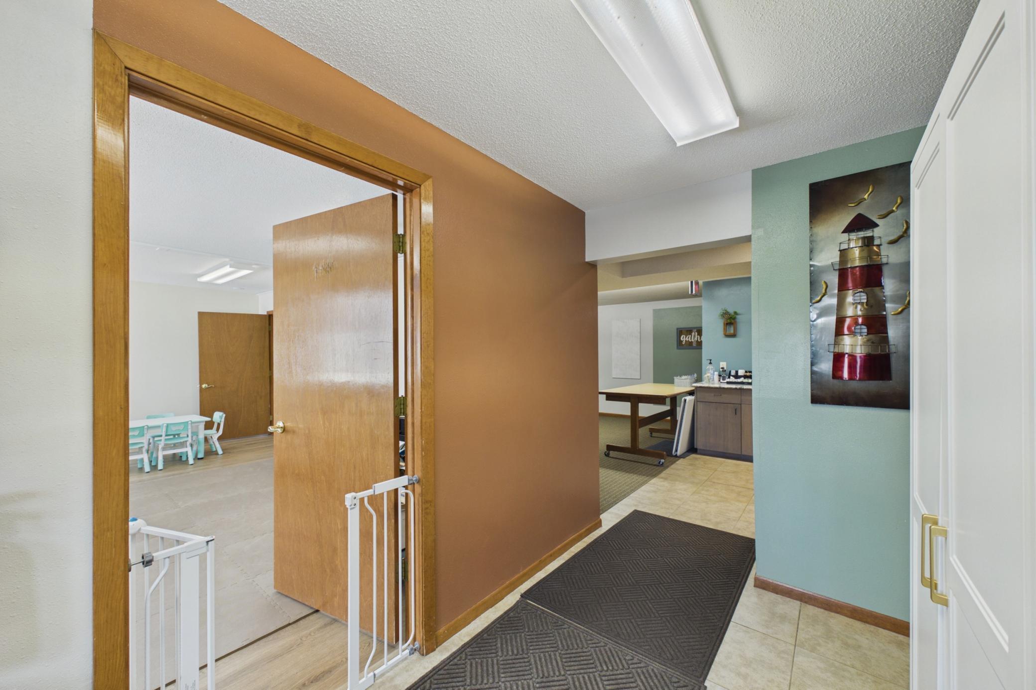 Hallway leading into downstairs