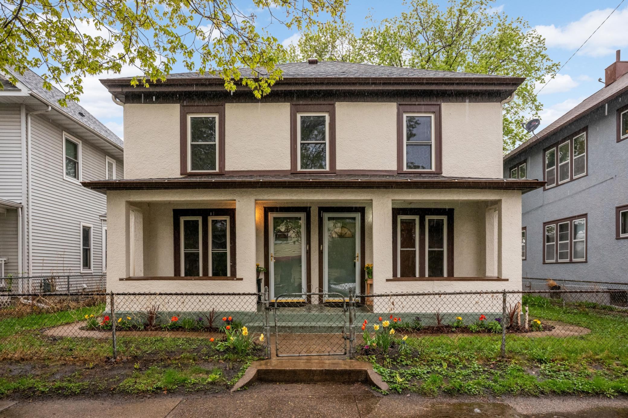2-Story Side-by-Side Duplex with front porch and separate entrances
