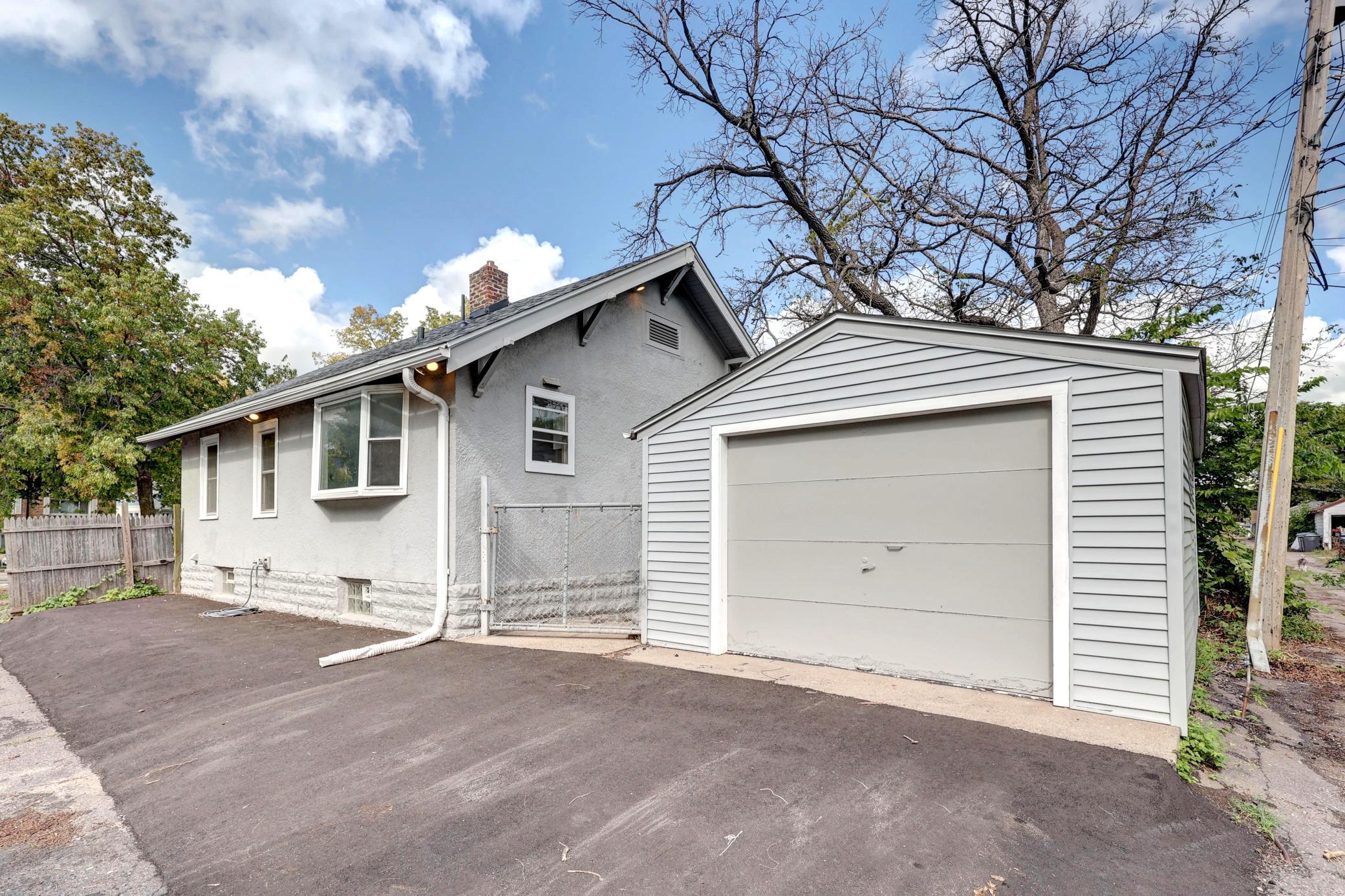 A Generous-Sized Garage has Newer Vinyl Siding. A Garage Door Opener will be Super when Winter hits! The Roof was Replaced at the Same Time as the House.