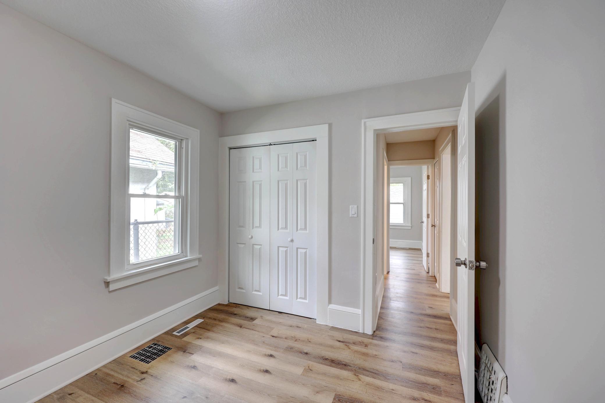 One of the two Cozy Bedrooms Cohesively Remodeled to Blend the Calm, Serene Decor. Even the Ceilings are Fresh!