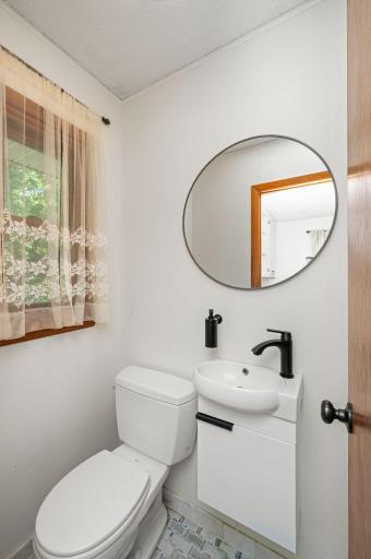 1/2 bathroom on main level next to laundry room