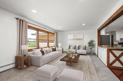 Step inside to a bright, open floor plan featuring fresh, brand-new flooring throughout