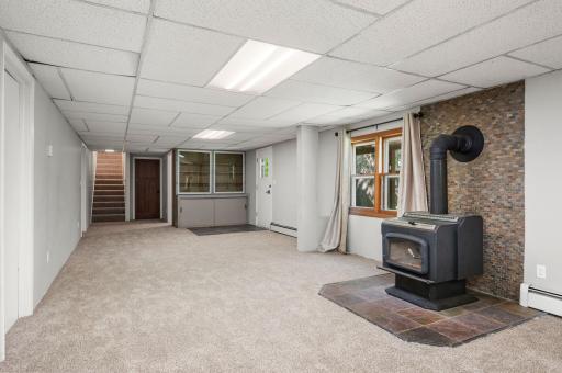 ith the huge walkout lower level, you will find a massive family room and a cozy wood-burning fireplaceâperfect for movie nights