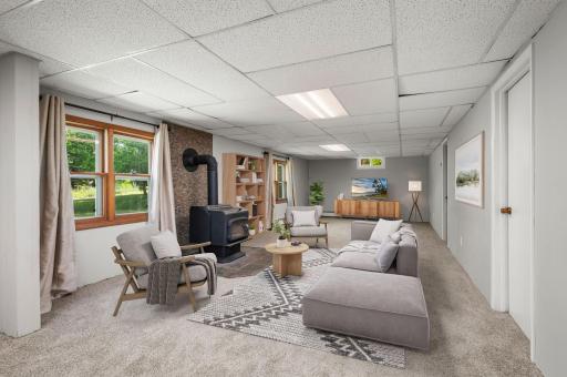 ith the huge walkout lower level, you will find a massive family room and a cozy wood-burning fireplaceâperfect for movie nights
