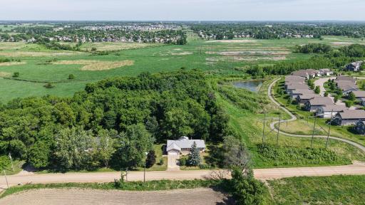 Welcome to your own private 1-acre oasis ! This fantastic walkout rambler offers the perfect blend of space, privacy, and country living, all while backing right up to the protected St. Michael Wildlife Management Area.
