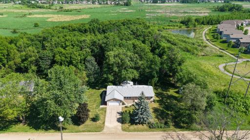 Welcome to your own private 1-acre oasis ! This fantastic walkout rambler offers the perfect blend of space, privacy, and country living, all while backing right up to the protected St. Michael Wildlife Management Area.