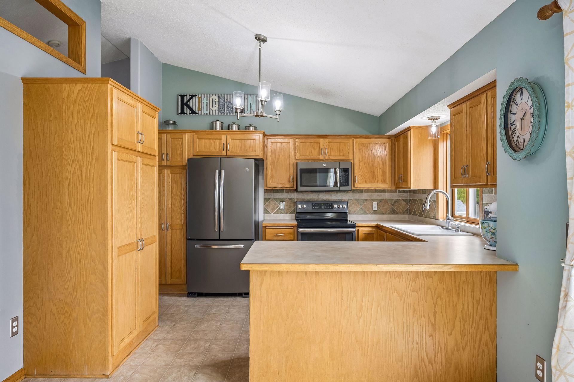Two large built in pantries store all of your small appliances & food