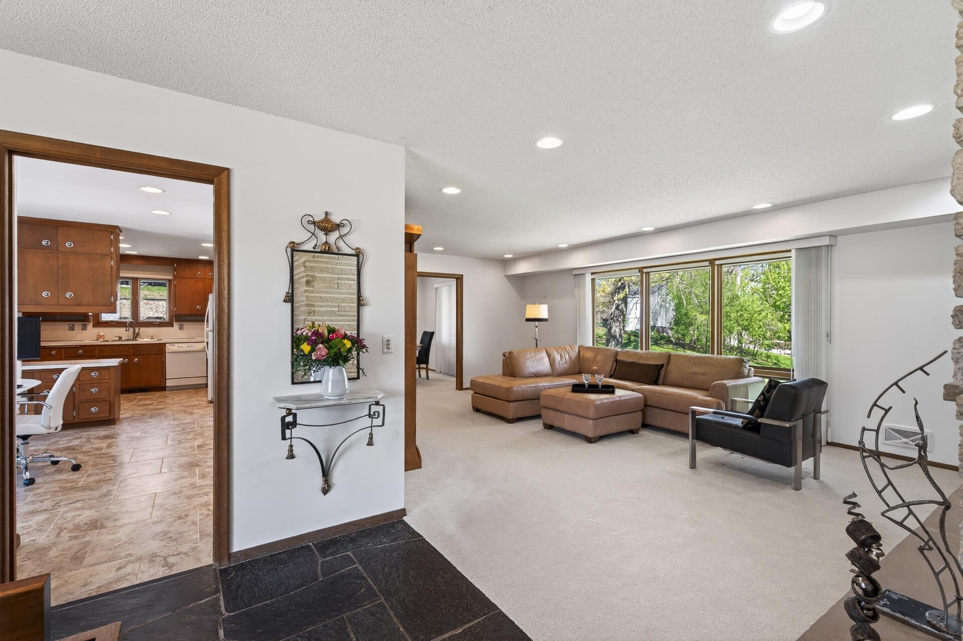 Nice flow from foyer to breakfast area to kitchen, then dining room and living room. A side entry leads directly into a small mudroom and kitchen.