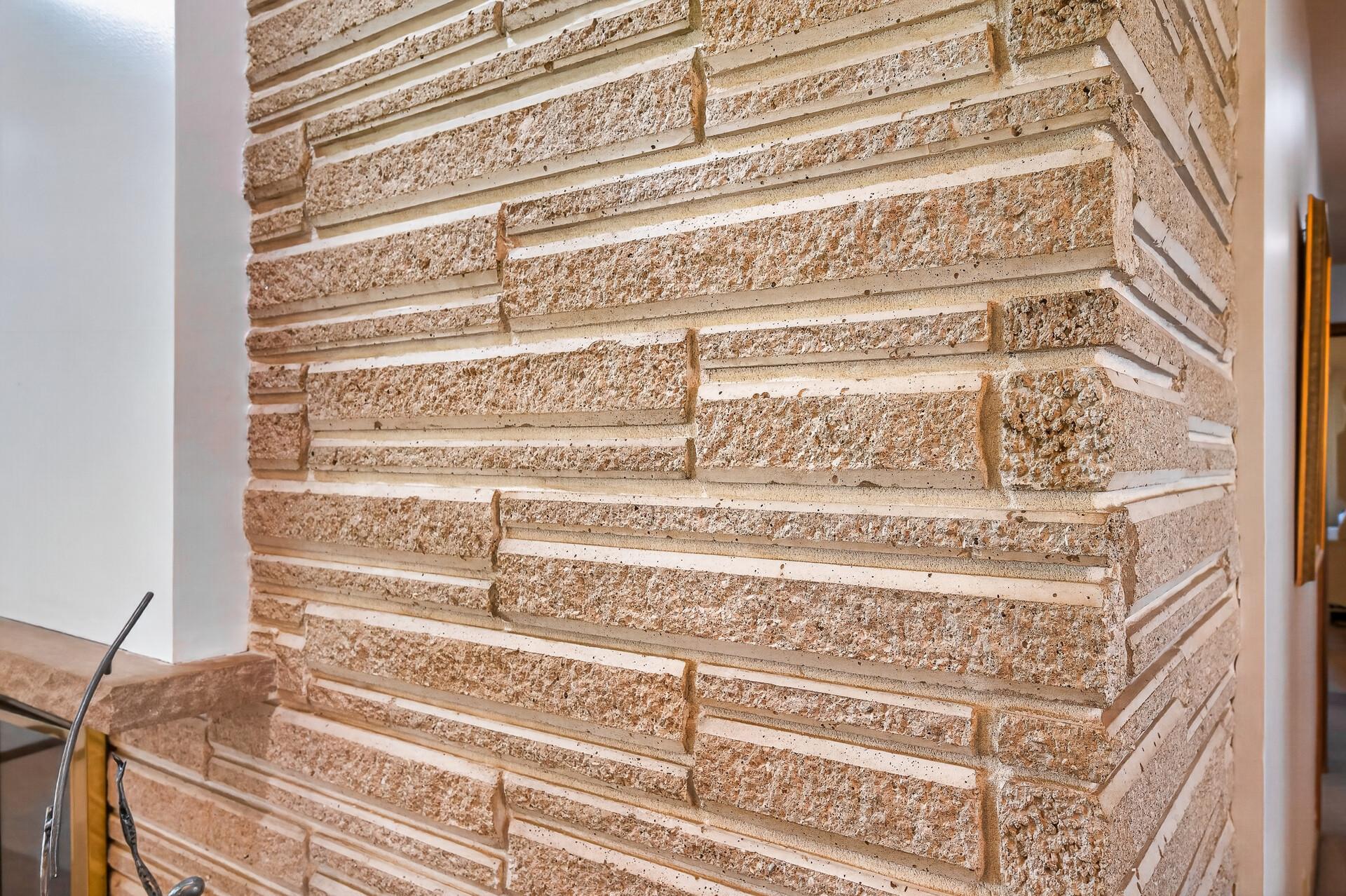 Close-up of the beveled stone which is also on the front of the home