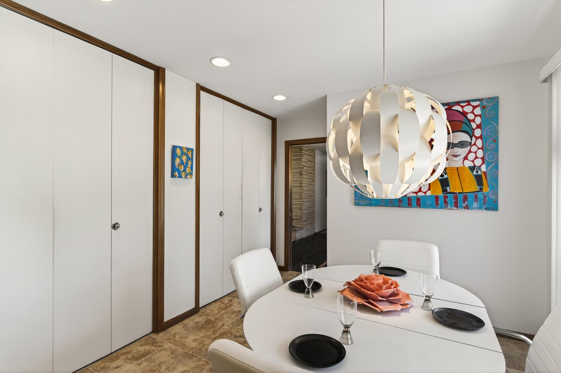 A wall of pantry storage in the breakfast area