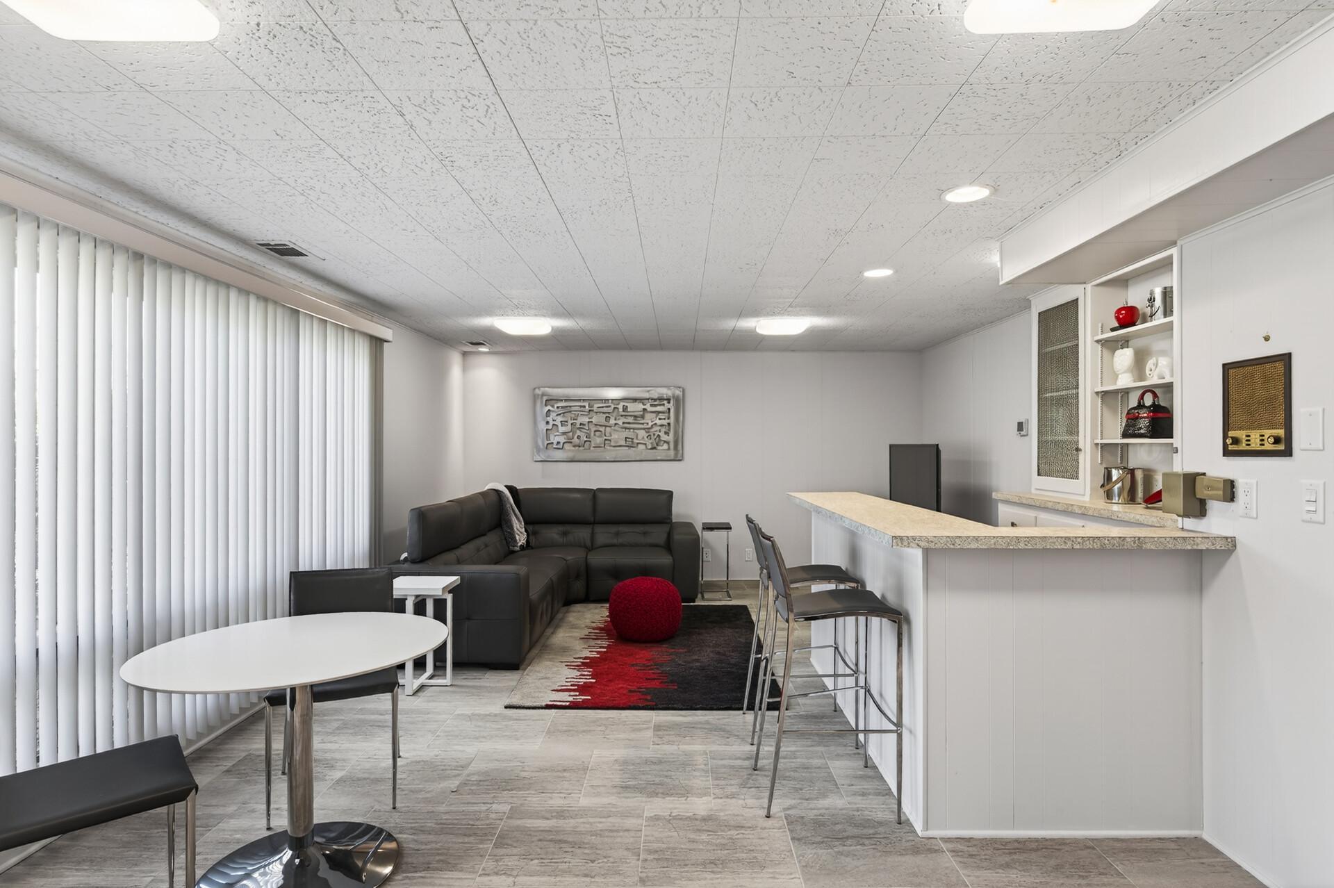 Family, recreation space, and a dry bar