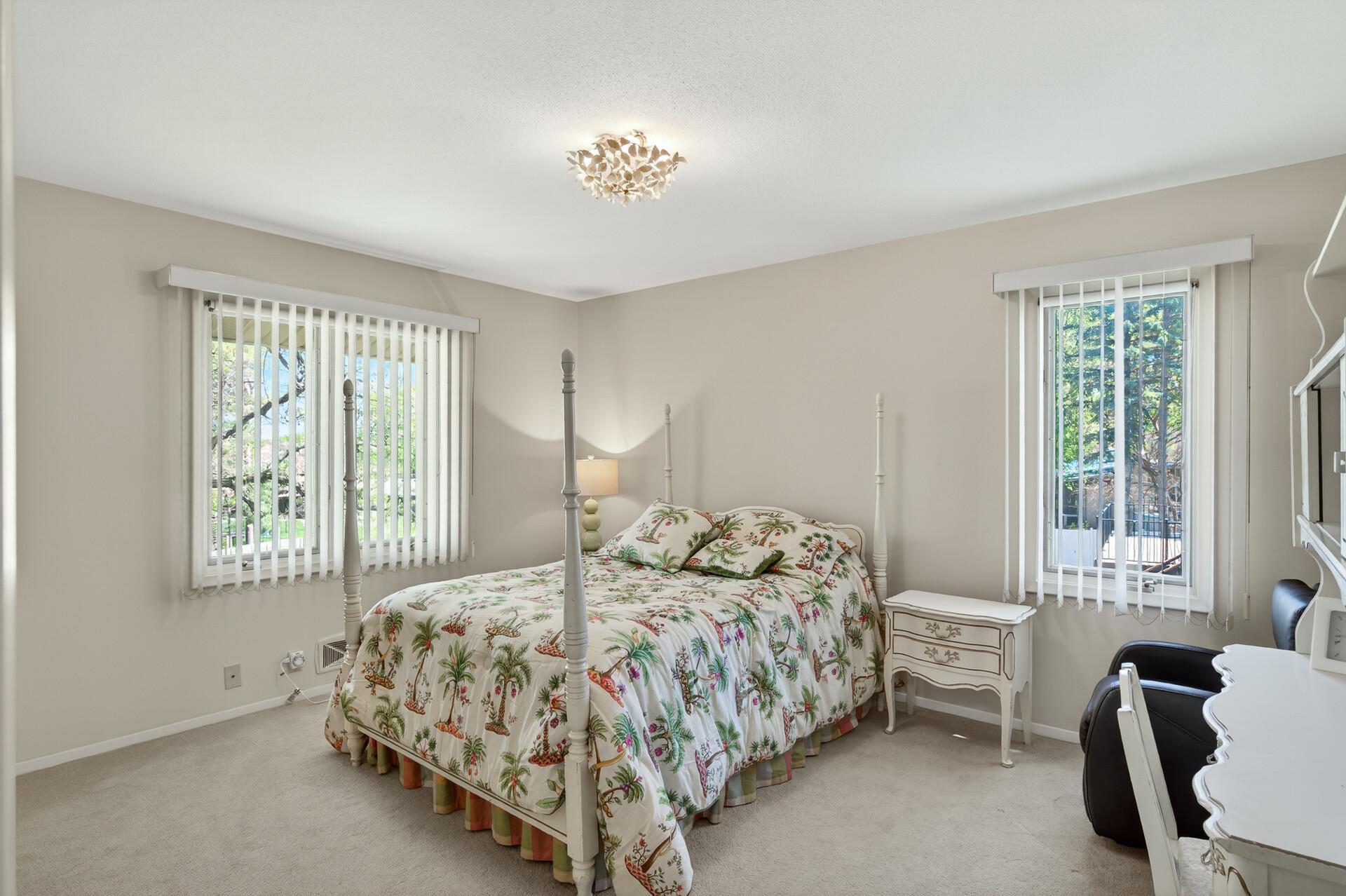Generous sized junior bedroom with two large windows