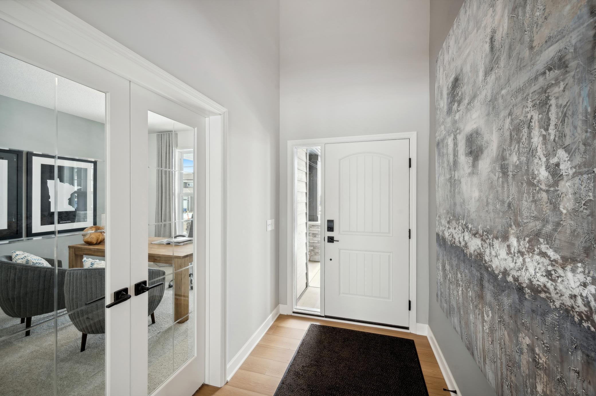 (Photo of a decorated model, actual homes finishes will vary) Make the best first impression with this entry!