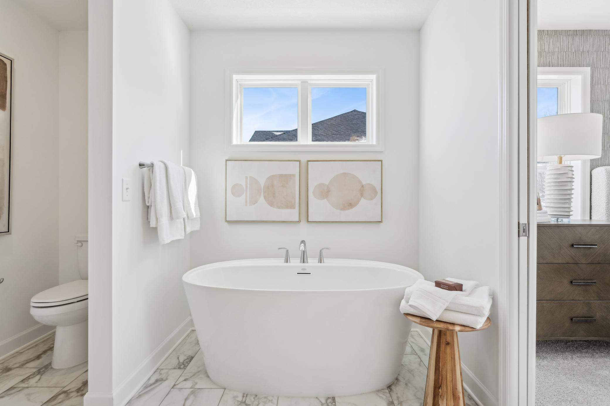 (Photo of a decorate model, actual homes finishes will vary) Another view of the primary bath.